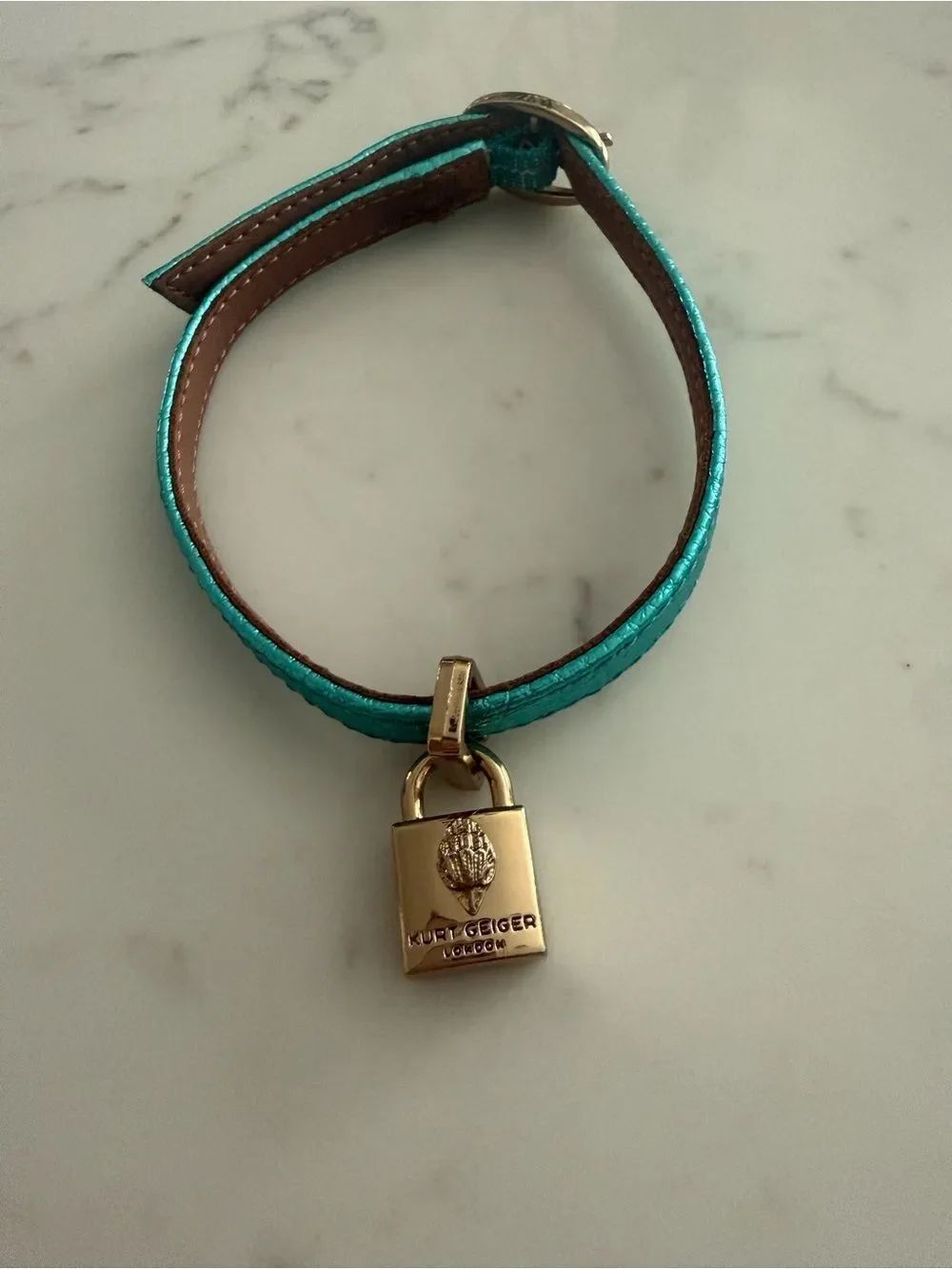 Kurt Geiger London Turquoise Leather Bracelet with Gold Padlock Charm